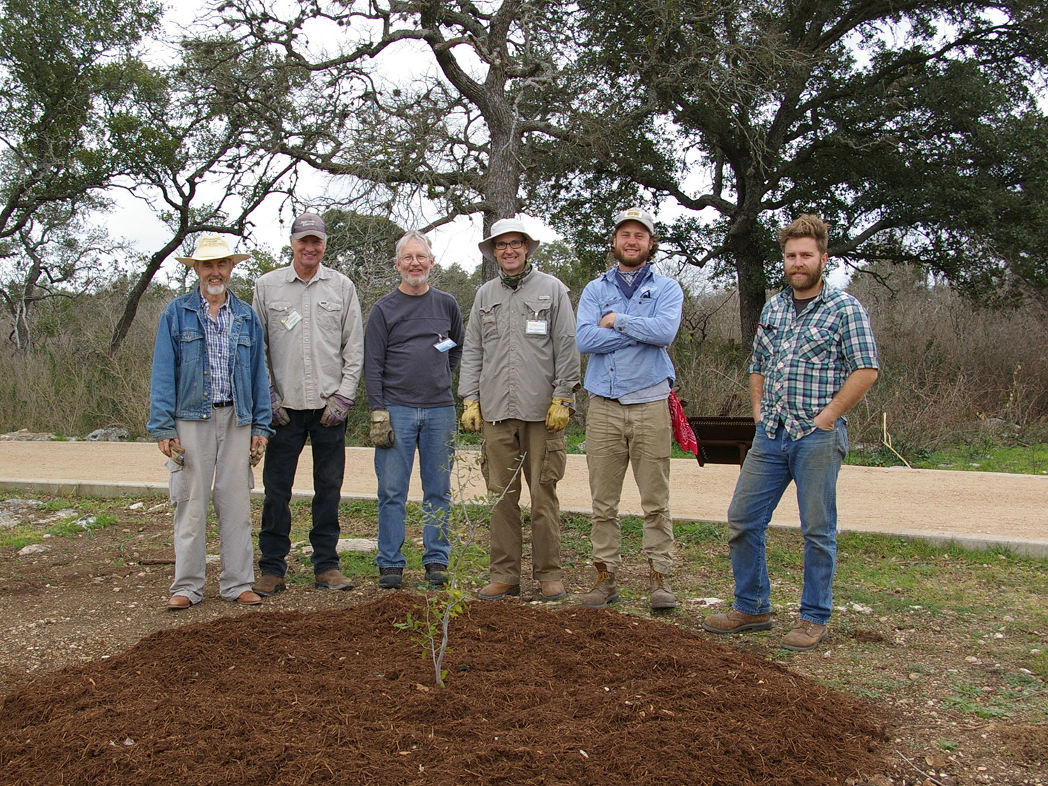 Volunteers and staff planting the first round of Hall of Texas Heroes Trees