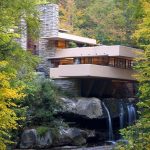 Frank Lloyd Wright's Fallingwater surrounded by plants and trees