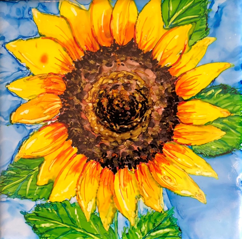 Sunflower in alcohol inks on ceramic tile by artist Andrea Patton